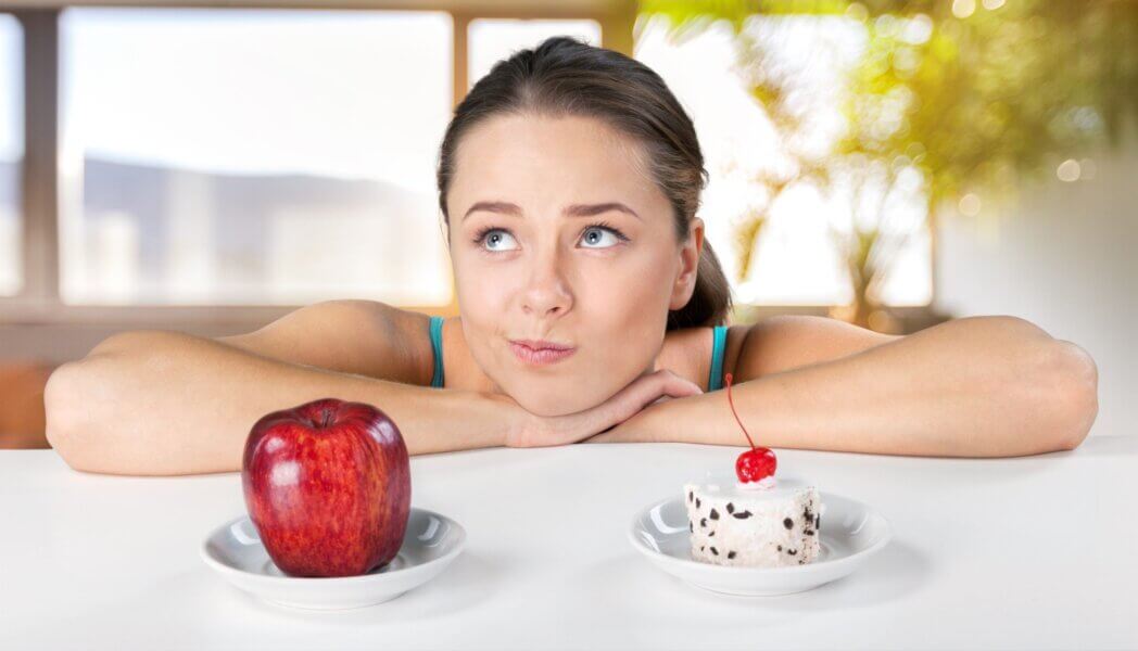 harmful foods and beverages for teeth and health. woman thinking about which food options. Healthy vs not healthy. 